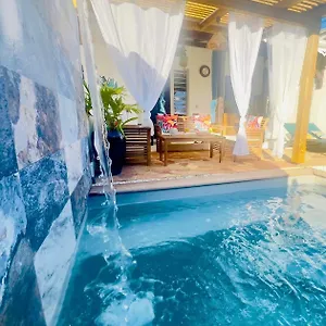 https://t2-paisible-jacuzzi-jardin.comcaribbean.com